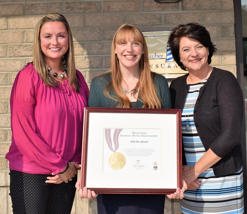 Beth Mitchell, winner of Ohio's 2018 Outstanding CSR of the Year Award, with OIA's Jodie Shaw and Carey Wallace
