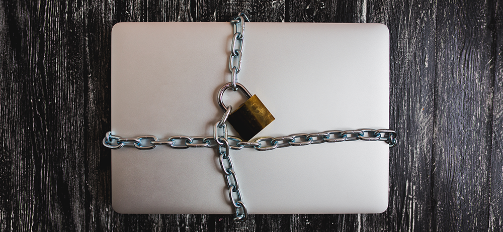 Laptop with padlock chain image