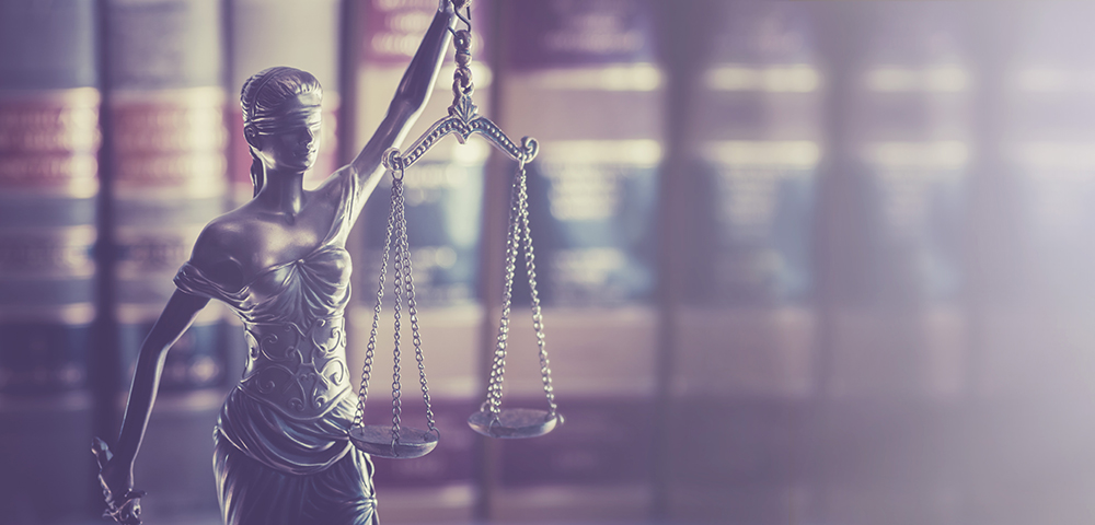 Lady Justice holding scales image